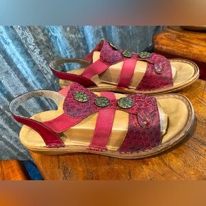 Rieker woman’s sandals in Red!  Comfy soles and bronze medallions! Size 7.5